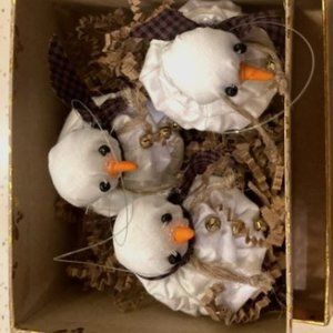 Set of three handmade snowman ornaments. Approximately 1 1/2 inches wide 1 inch